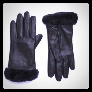 Black leather UGG  gloves lined in cashmere.